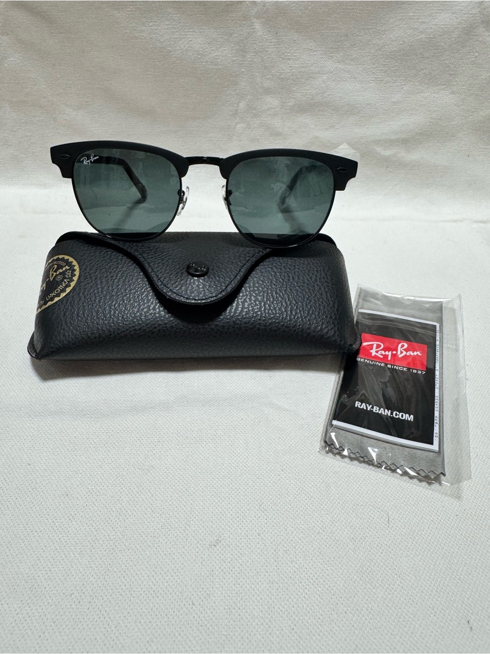 Ray-Ban Black Frame Sunglasses with Green Lenses